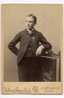 1890s Photograph of Young Man Wearing Badge in Lowell, Massachusetts