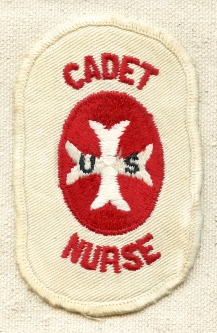 WWII Smaller Size Cadet Nurse Patch on White Twill Removed from Uniform