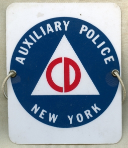 Great Cold War Era Civil Defense Auxiliary Police Celluloid Arm Badge for New York