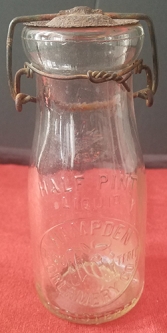 Wonderful 1910's-20's Hampden Creamery Tin Top, Cow Head Half Pint Bottle from Mass