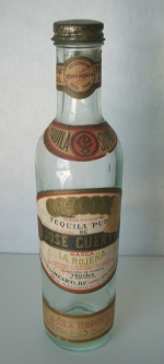 Great 1930s Jose Cuervo Tequila Bottle with Original Top, Label & Texas Tax Stamp