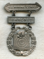 Circa 1943 USMC Marksman Badge with Bayonet Qualification Bar in Wartime Materials