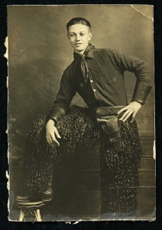 Cool Ca. 1900's RPPC (Trimmed) of Young Cowboy Wearing 'Woolies' Chaps, Leather Cuffs, and Colt .45
