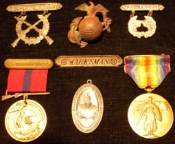 WWI US Marine Corps Medals and E, G, & A hat badge of William Gregory of Washington