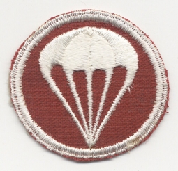 Early WWII US Army Parachute Field Artillery Cap Badge on Red Twill
