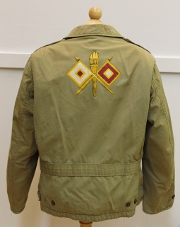 WWII M-41 Field Jacket as worn by Signal Officers with Signal Corps Insignia Painted on Back