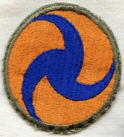 Nice, used 1940 US Air Corps Pinwheel Shoulder Patch with O/D Border