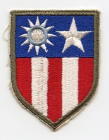 WWII US Army CBI Theatre Shoulder Patch Light Blue Ring Variant with O/D Border